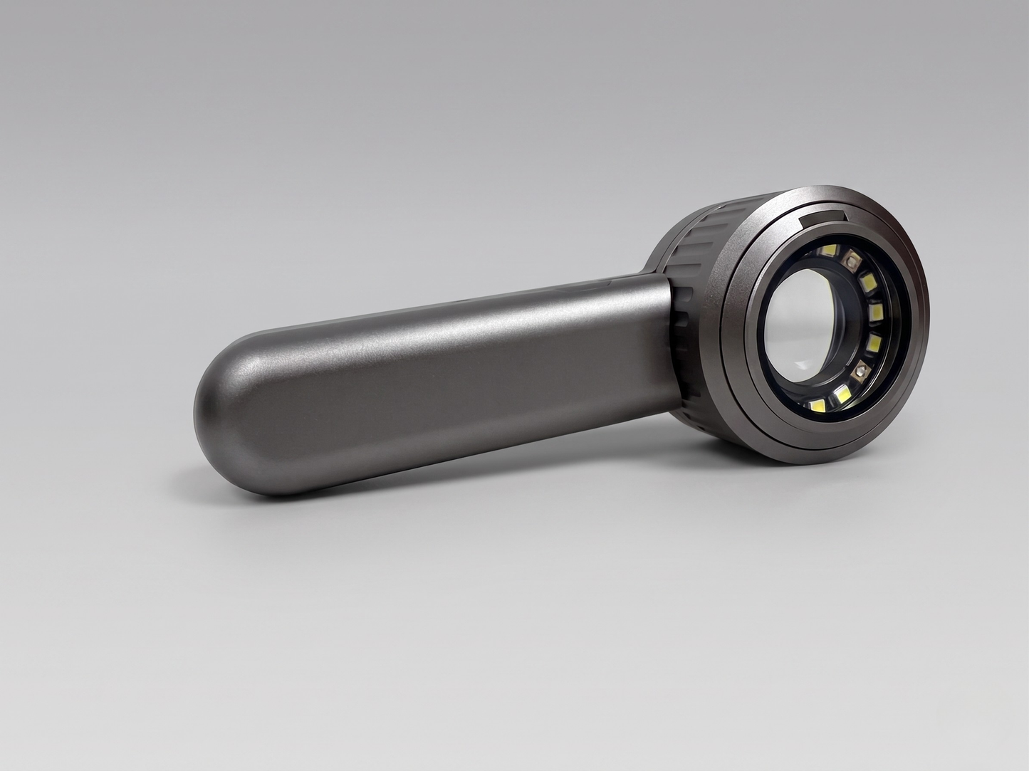 SkinLens Pro dermatoscope — rear profile showing ergonomic handle