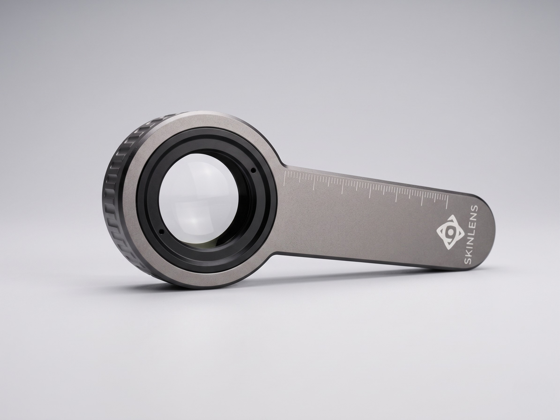 SkinLens Pro dermatoscope — top-down view of optical glass lens