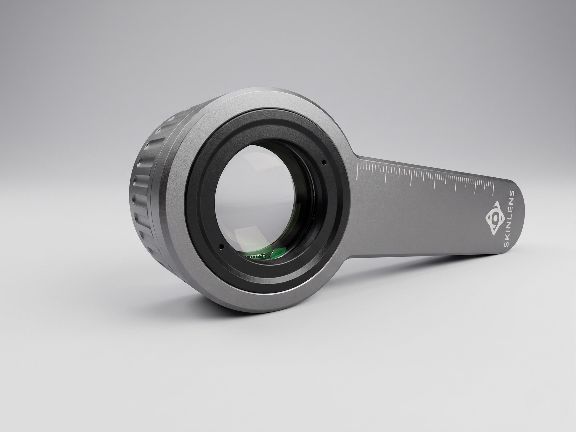 SkinLens Pro dermatoscope — three-quarter view showing optical glass lens and measurement scale